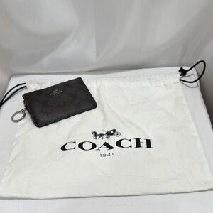 Coach Dark Brown Monogram Pouch EUC with dust bag